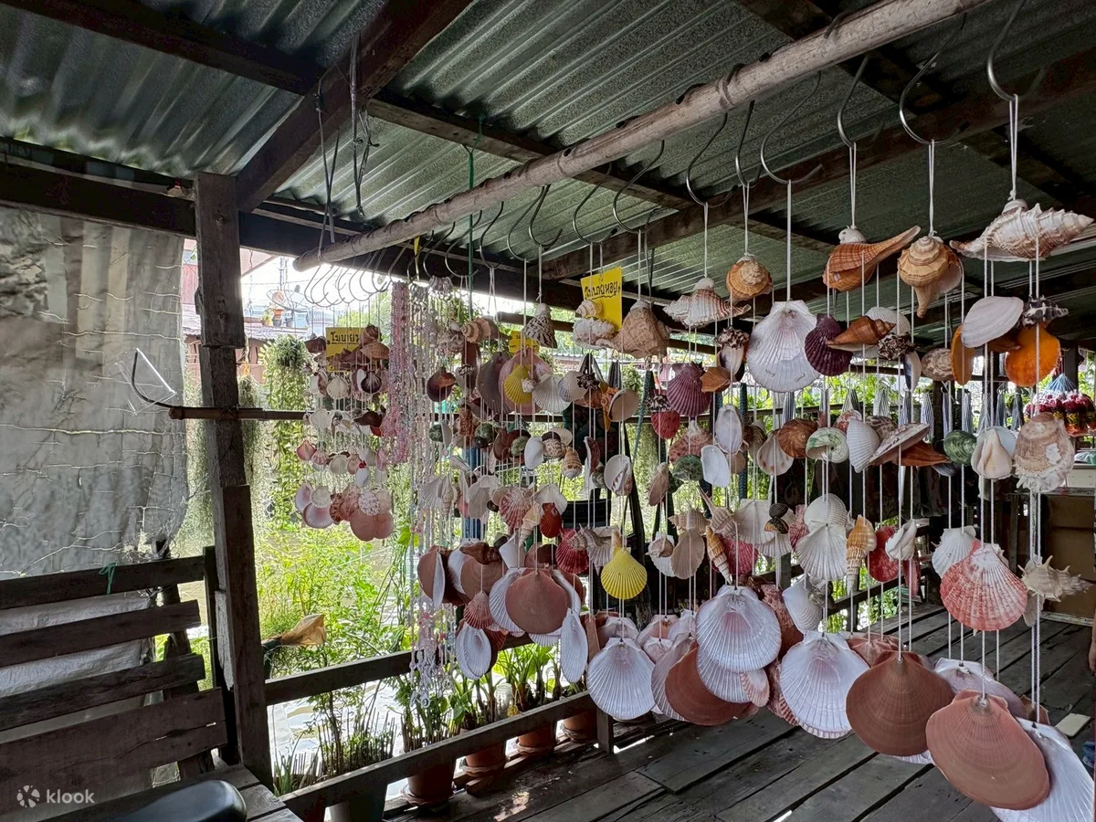 Hand-painted masks and ceramics hanging at the Artist's House