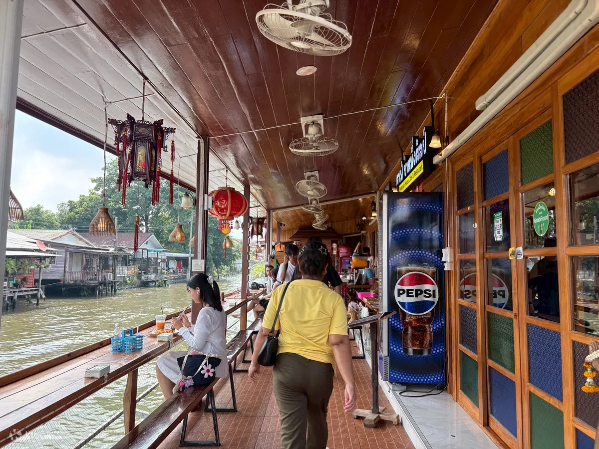 The canalside walkway of shops and cafes at Khlong Bang Luang