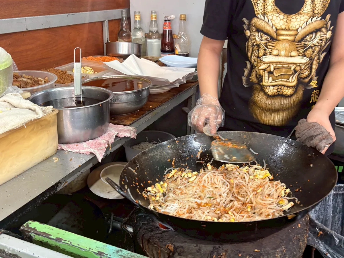 Pad thai cooked to order at a Talat Phlu food stall
