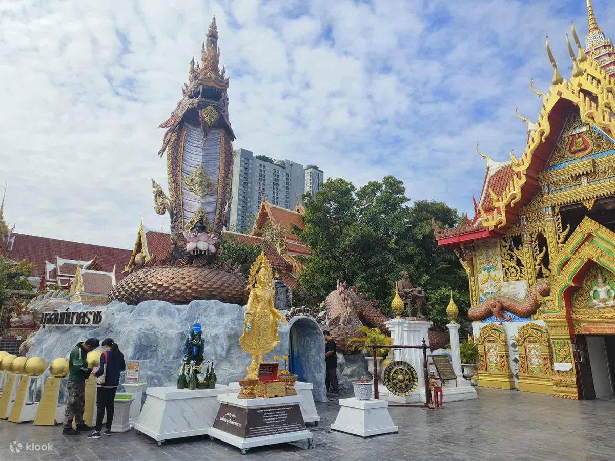 A Naga serpent shrine in the temple grounds at Wat Nak Prok