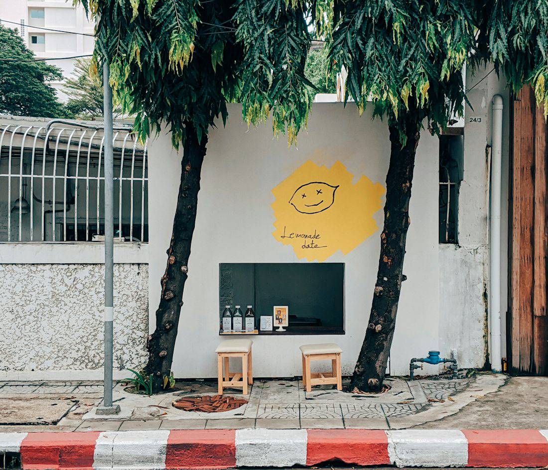 Small neighborhood cafe with a walk-up window in Bangkok