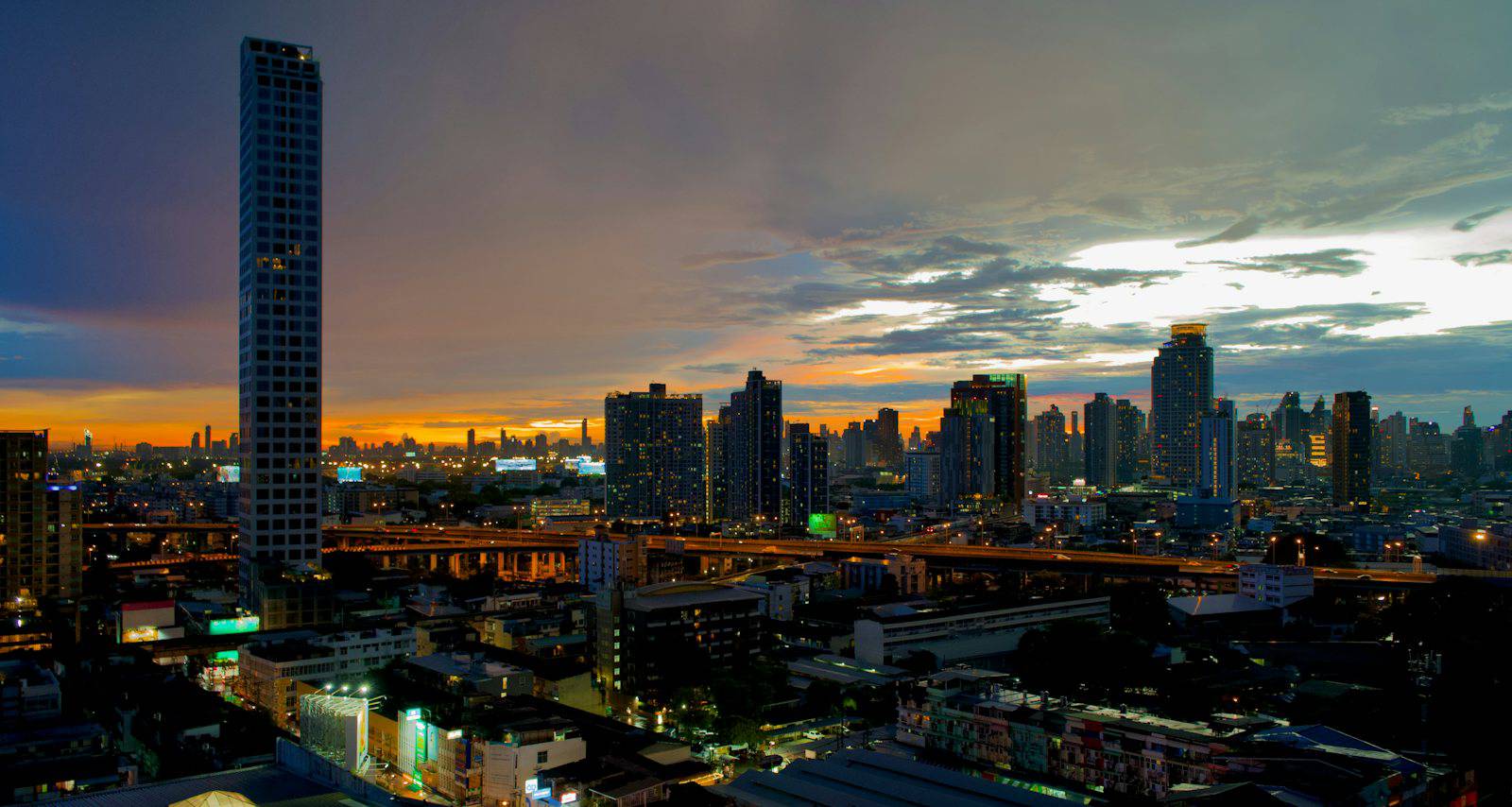 Bangkok neighborhood skyline near a BTS line