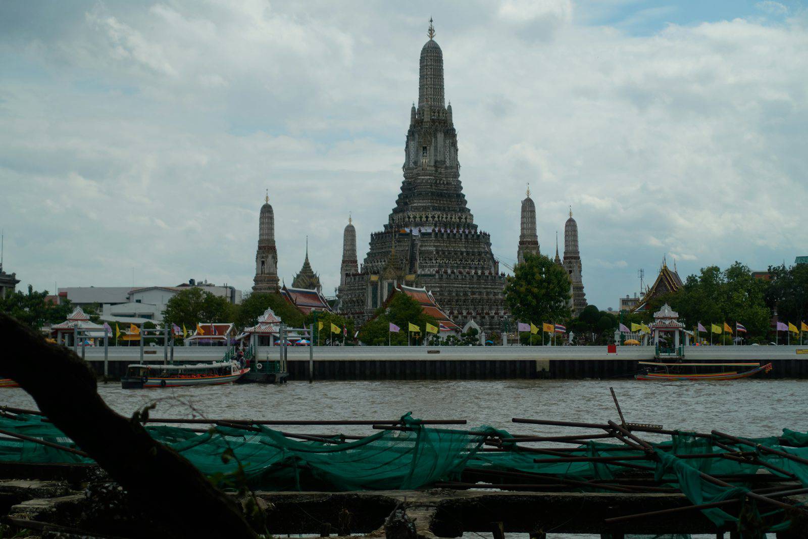 Wat Arun and the Chao Phraya River skyline in Bangkok
