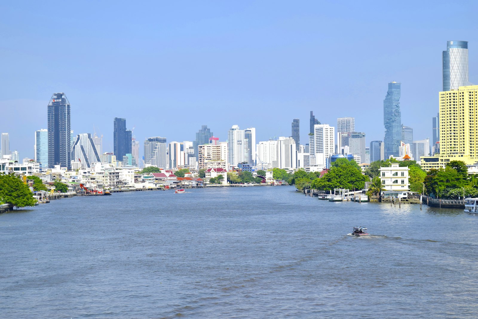 The Chao Phraya river and the Bangkok skyline in daylight