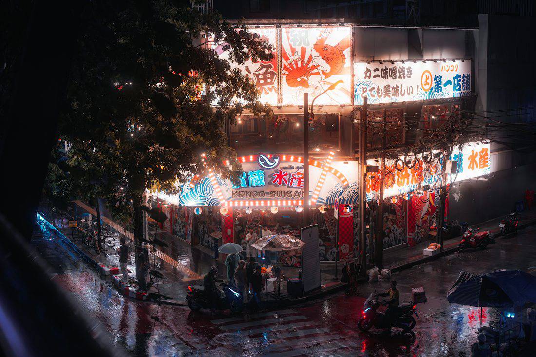 Bangkok evening street lights and nightlife energy